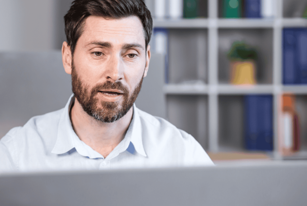 man documenting complex processes in SOPs