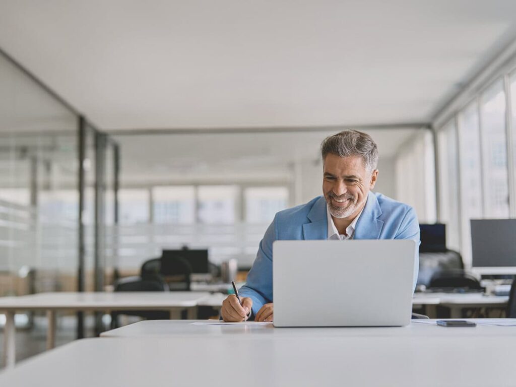 a business owner constructing a operations management framework in his office